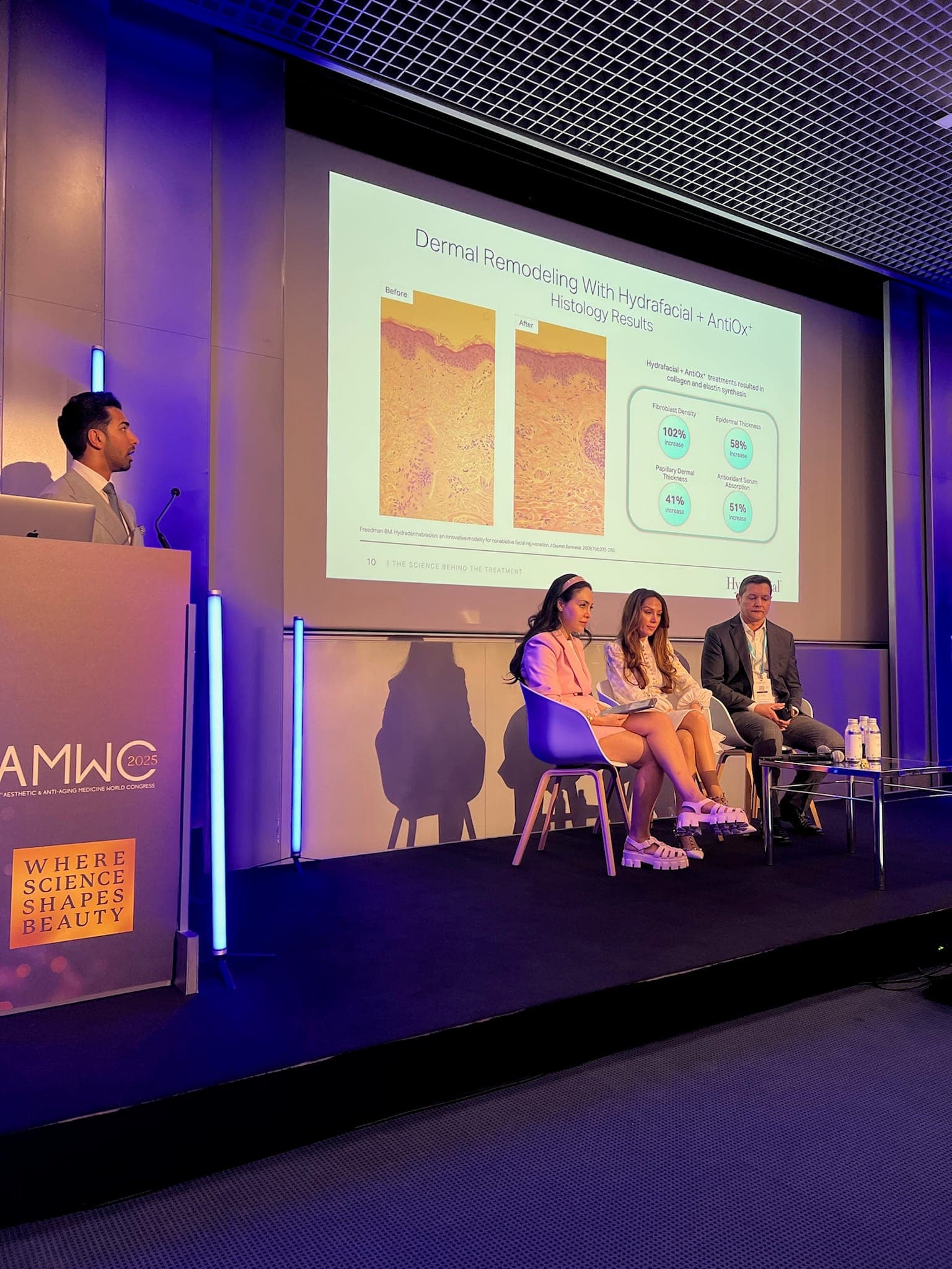 Dr Kamran Amjed presenting at a healthcare industry event